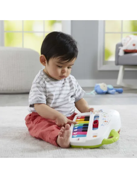 Fisher-Price Pianoforte di Cagnolino Ridi & Impara Edizione Multilingue, Portatile con Luci, Versi degli Animali, Contenuti Educ